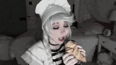 Belle Delphine Cooking GIF - Belle Delphine Cooking Eating A Croissant GIFs