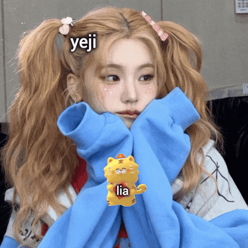 a girl with pigtails has the word yeji written on her head