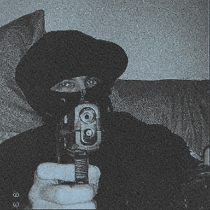 a man wearing a mask is holding a gun that says ' wayne ' on it