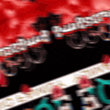 a blurred image of a roller coaster that says ' a ' on it