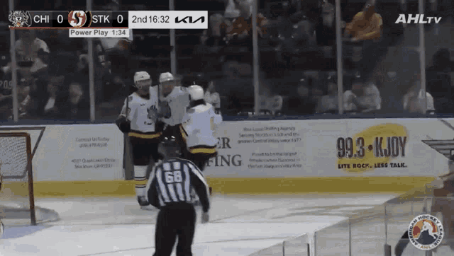 a hockey game is being shown on ahltv and the score is 0 to 0