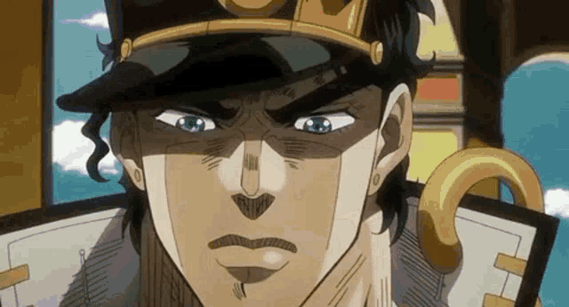a close up of a cartoon character 's face wearing a hat .