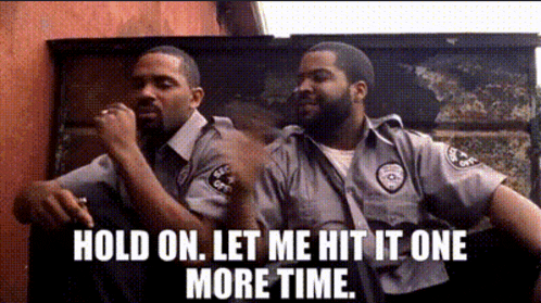 two security guards are sitting next to each other with a caption that says hold on let me hit it one more time