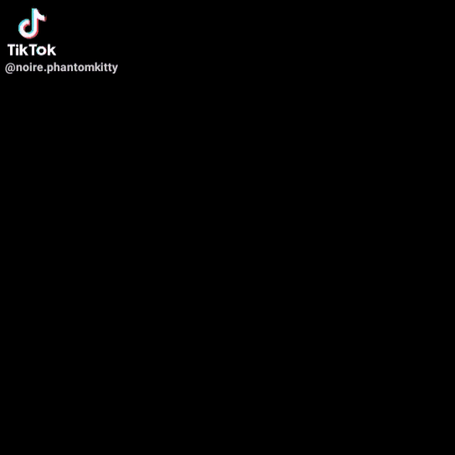a cartoon character with a cat tail is dancing in a video .