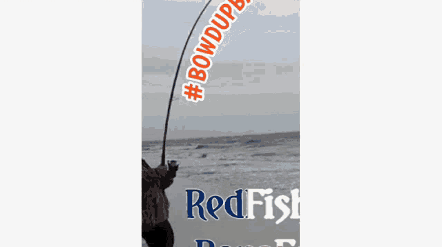 a man holding a fishing rod on the beach with the words bowdupbaby redfish repofan