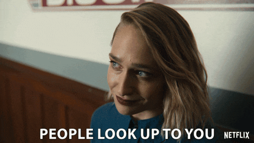 a netflix ad shows a woman and the words people look up to you
