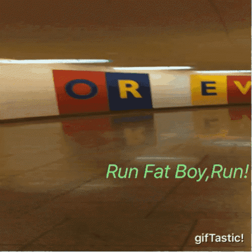 a sign that says " run fat boy run " is on the floor
