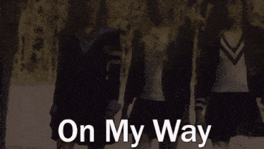 a group of girls standing next to each other with the words " on my way " written below them