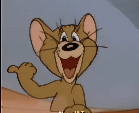 jerry from tom and jerry is smiling with his mouth open