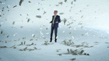 a man in a suit and tie stands in a field of money