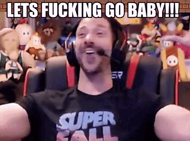a man wearing headphones and a super fall t-shirt says lets fucking go baby