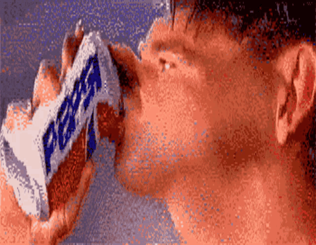 a pixelated image of a man drinking a pepsi