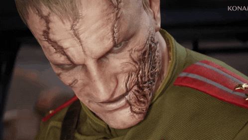 a close up of a man 's face with kona in the corner