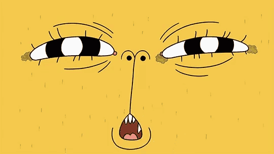 a close up of a cartoon face with a tongue out