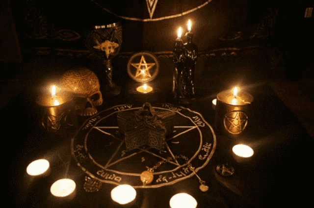 a pentagram surrounded by candles and a skull with a necklace that says ' ecru ' on it