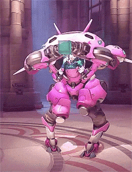 a pink robot with a green cube on its head is standing on a tiled floor .