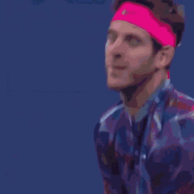 a tennis game is being played on a court that has chase written on the walls