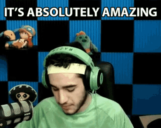 a man wearing green headphones and a headband says it 's absolutely amazing .