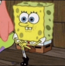 spongebob squarepants is sitting on a box with his legs crossed