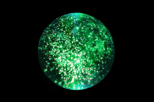 a sphere with a black background and a yellow center