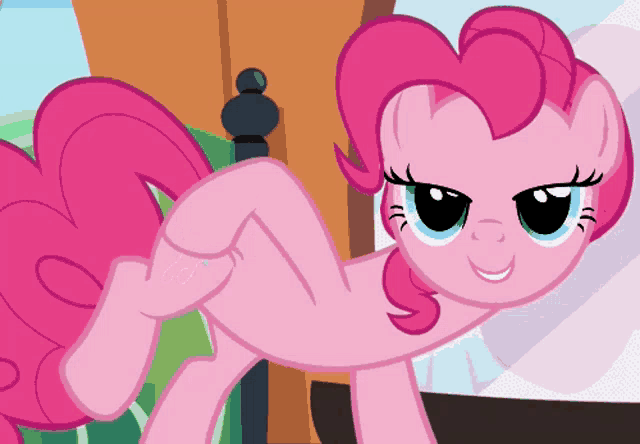 pinkie pie from my little pony is laying on her back