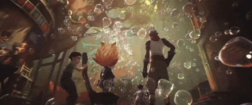 a group of people are standing in a room with bubbles coming out of the ceiling