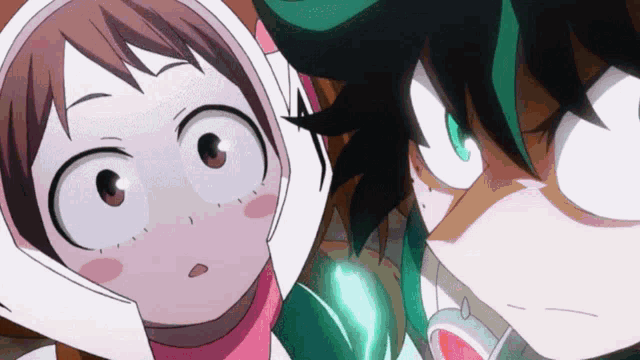 a girl and a boy are looking at each other with their eyes wide open