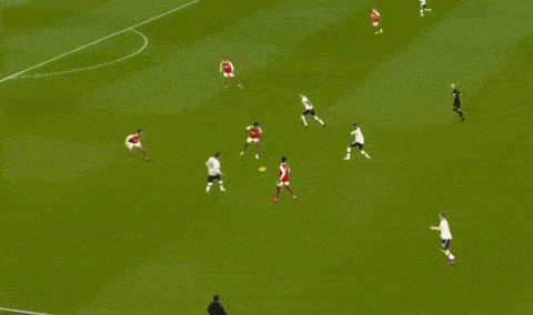 a soccer player in a white shirt is running on the field .