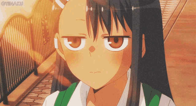 a close up of a girl 's face with a watermark of minaku