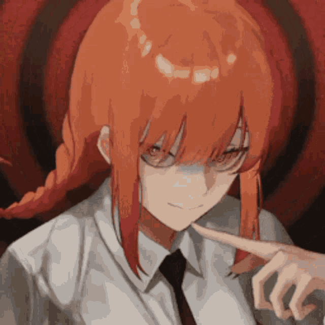 a girl with red hair and glasses is wearing a white shirt and tie and pointing at something .