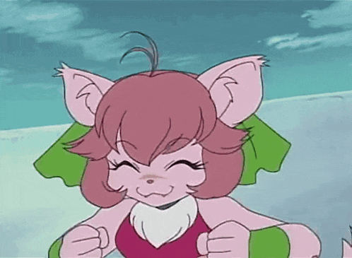 a cartoon character with pink hair and green bows on her ears is smiling and making a fist .