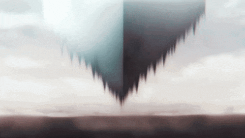 a pyramid shaped object is floating in the air above a desert