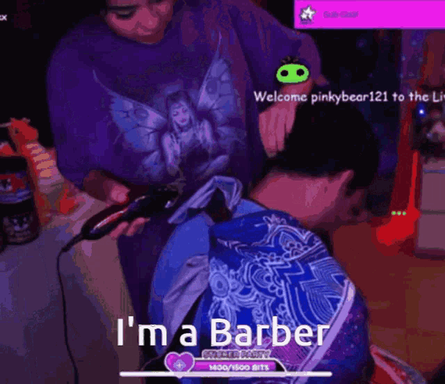 a man is getting his hair cut by a woman wearing a shirt that says fairy on it