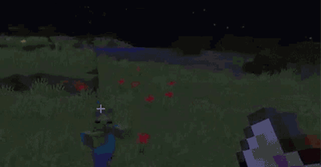 a person is holding a pickaxe in a minecraft video game .