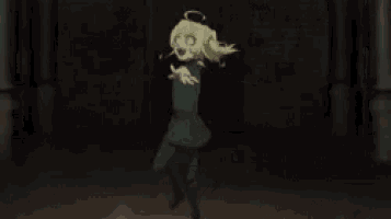 a girl in a green outfit is dancing in a dark room