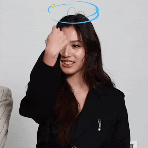 a woman wearing a black jacket has a blue halo on her head