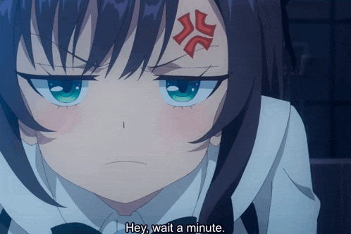 a girl with a red circle on her forehead says " hey wait a minute "