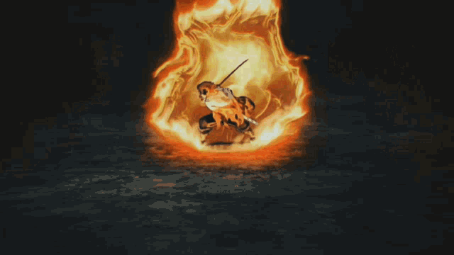 a large explosion in the dark with a lot of flames coming out of it