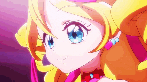 a close up of a girl with blue eyes