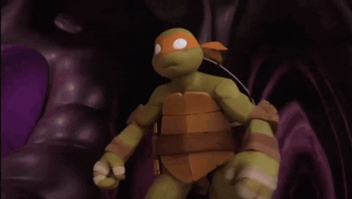 a teenage mutant ninja turtle stands in a dark room
