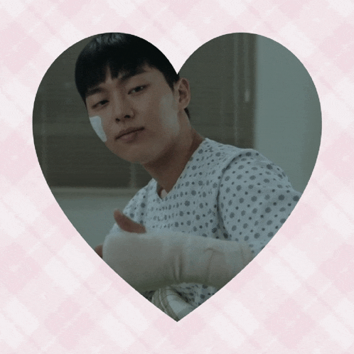 a man in a hospital gown has a bandaged arm