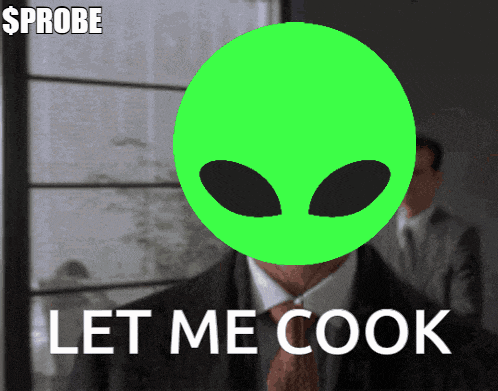 a man in a suit and tie has a green alien head on his face and the words let me cook below it