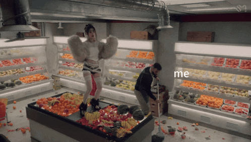 a woman in a fur coat is standing on a fruit stand and the word me is on the bottom left