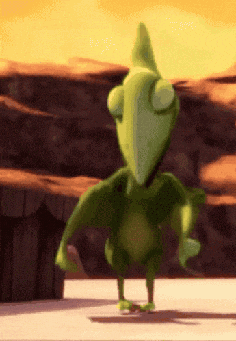 a green cartoon character is dancing in front of a desert landscape
