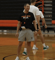 a man wearing a shirt that says polar bear pride