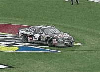 a race car that has the number 3 on the side