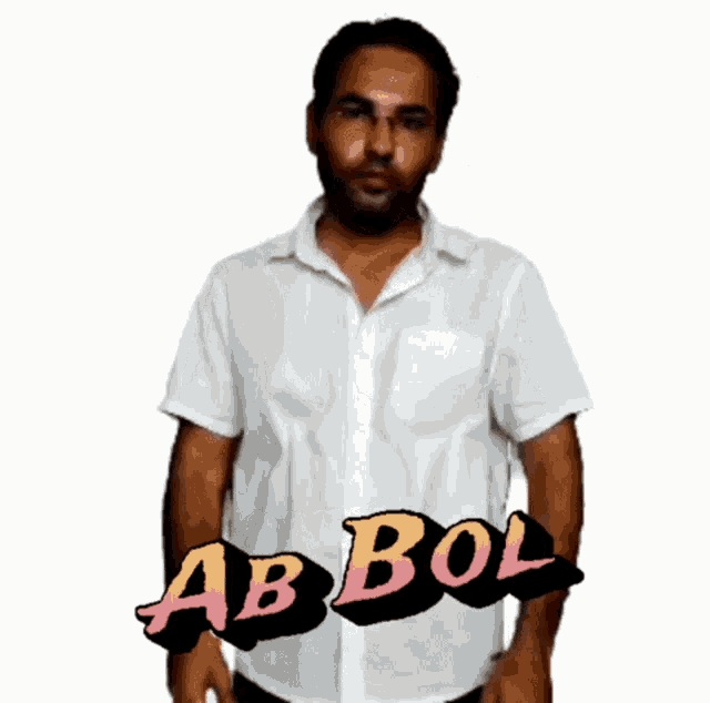 a man in a white shirt stands in front of a sign that says abbol