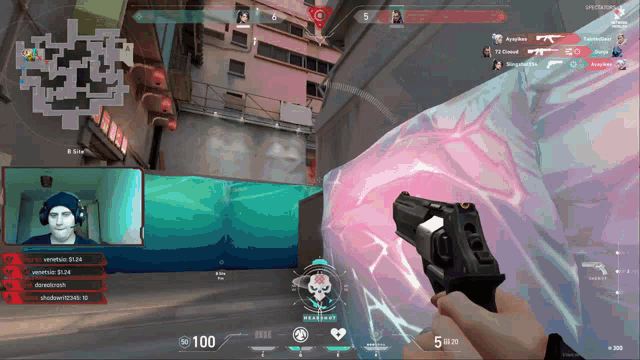 a person holding a gun in a video game with a score of 100