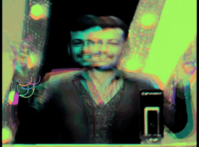 a blurry picture of a man with a phone that says ' i 'm sorry ' on it