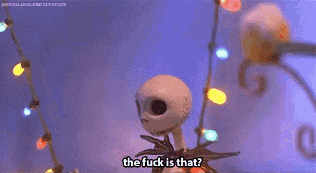 jack skellington from the nightmare before christmas is holding a string of christmas lights and says `` the fuck is that ? ''
